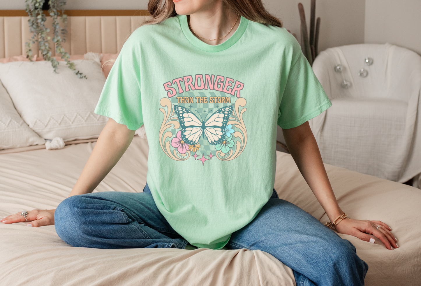 STRONGER THAN THE STORM GRAPHIC TEE